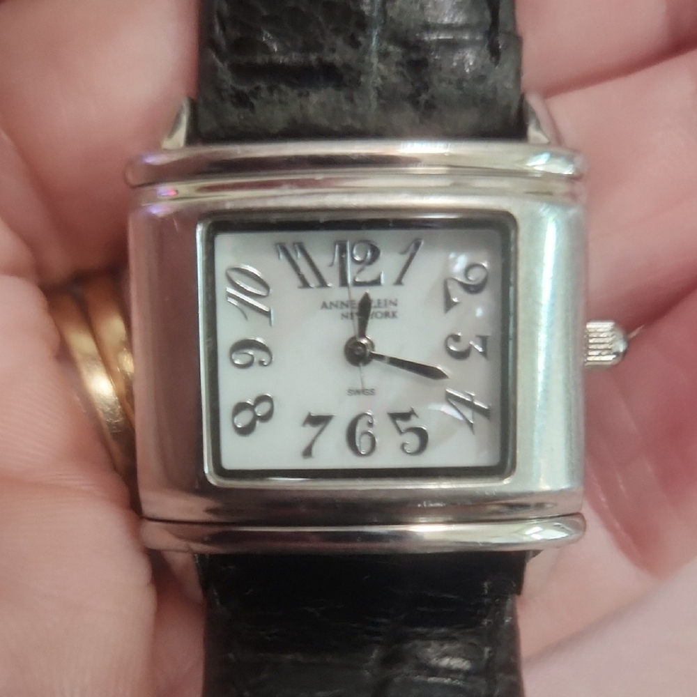 Anne Klein Silver Case Black Strap Watch